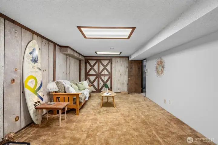 And what would a vintage home be, if it did not have a finished basement play/entertainment/room.  Not pictured is the wood pellet stove in the far corner to help keep things toasty. Check out the huge storage/mechanical room just to the right in this photo - it houses the central vac, tankless hot water heater and much more.