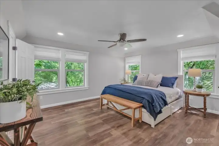 In the spa-like primary suite you can really bring the outdoors inside with these windows