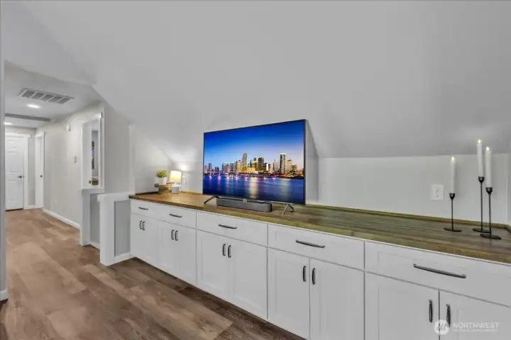 The loft is perfectly complimented with these built-ins