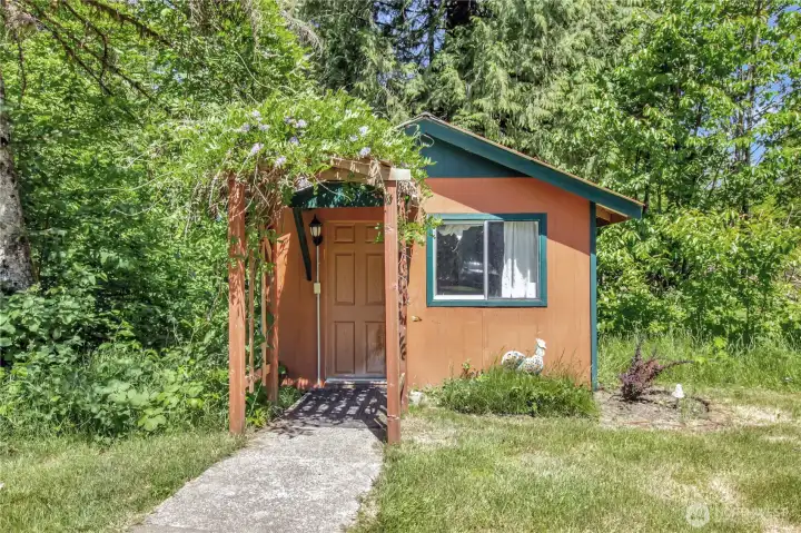 Hair salon with bathroom and wax/massage room.