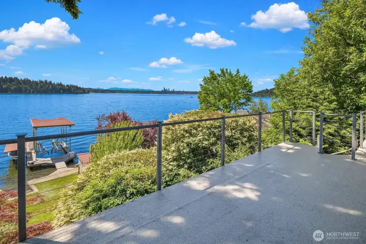 The deck off the living room provides a bird's eye view of Lake Washington