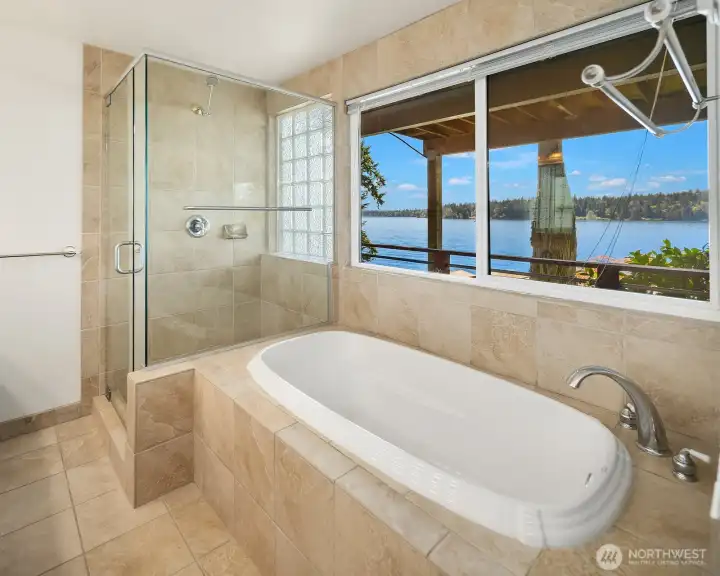 Walk in shower with jetted tub.