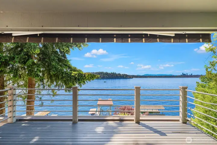 The private deck leading from the apartment equipped with a retractable awning for those sunny afternoons.