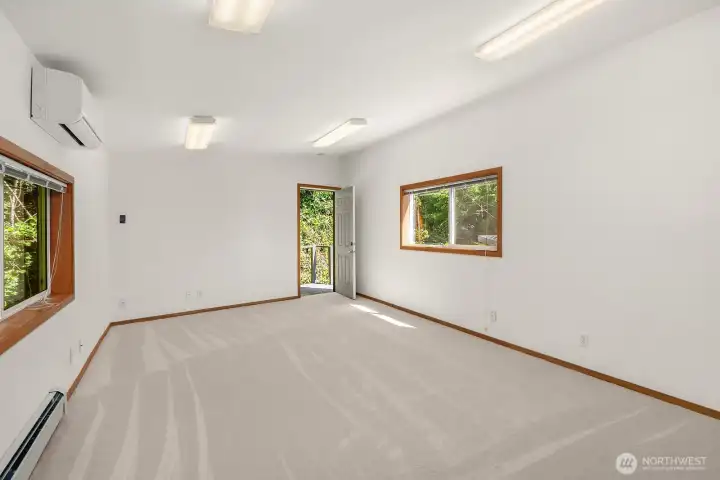Spacious bonus room with access to the outside.
