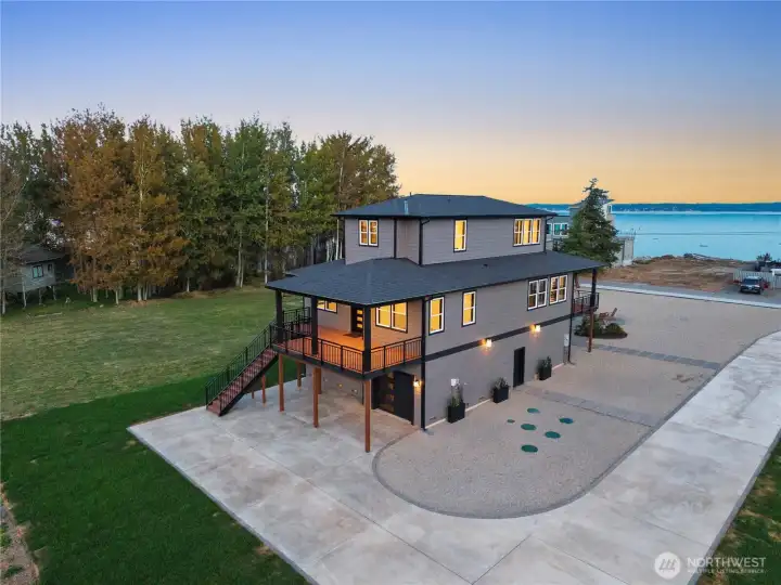 Welcome to this NEWLY completed Driftwood Shores home...
