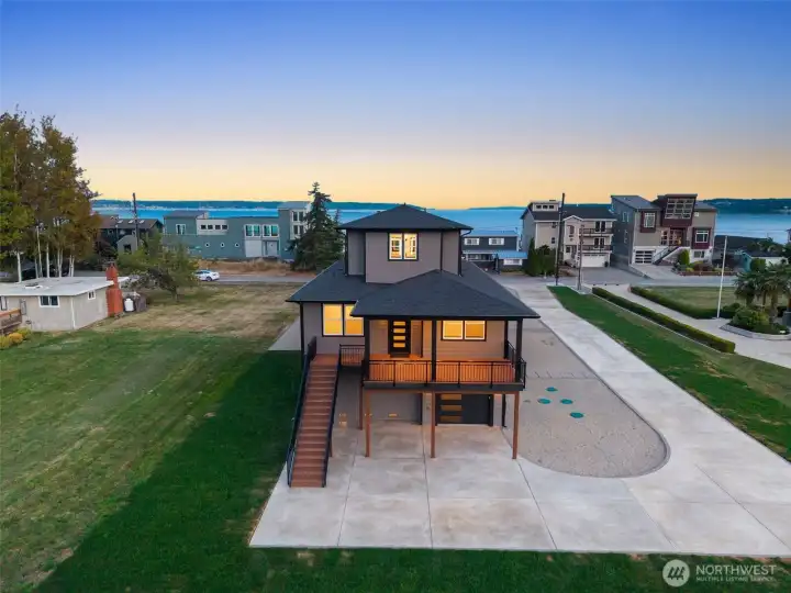 Paved driveway, private, multiple outdoor areas.