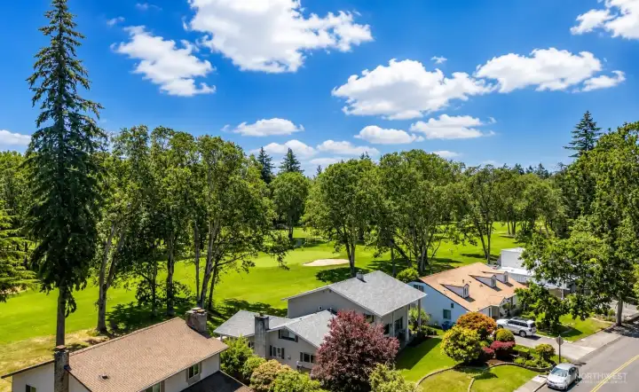Positioned near the green rather than the main fairway landing area, this exceptional setting offers the beauty of golf course living with minimal gof ball traffic.