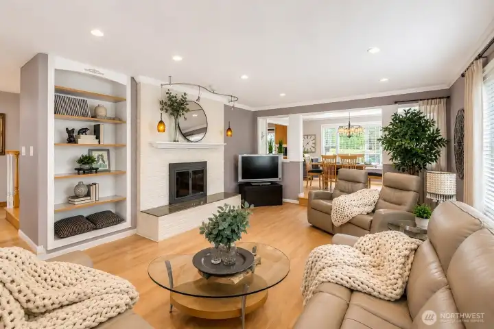 Rich hardwood floors and built in shelves.