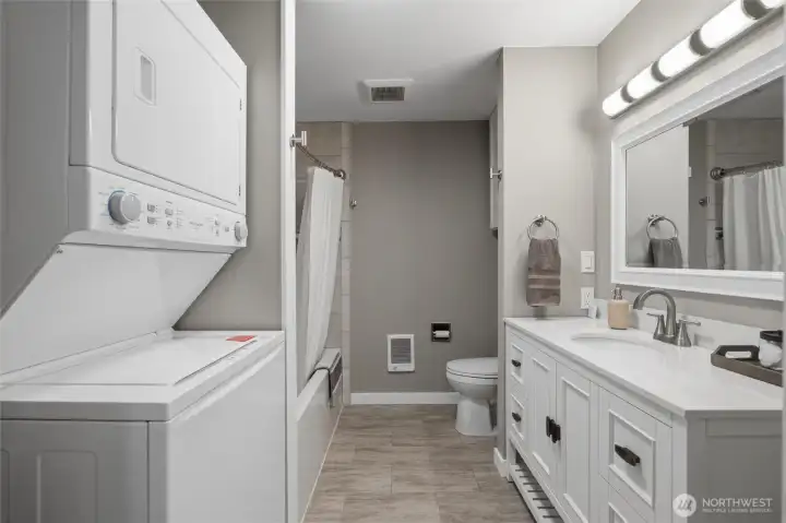 Main cabin laundry room and fully updated bathroom.