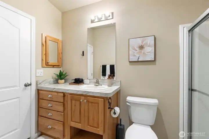 Bathroom with door to the primary