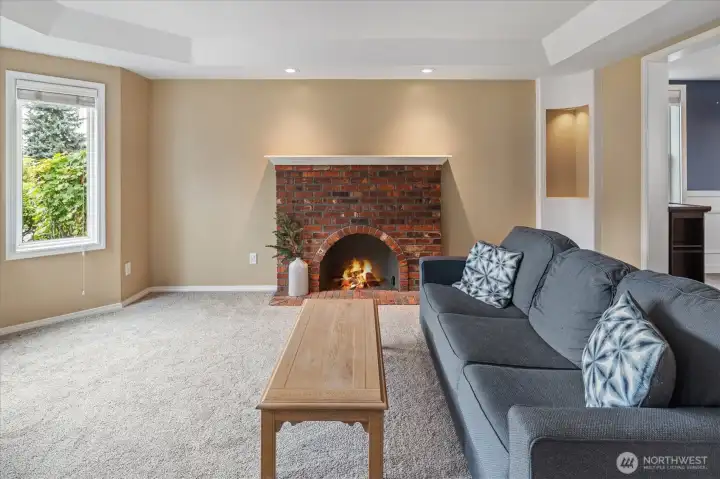 Formal sitting room is light filled and cozy
