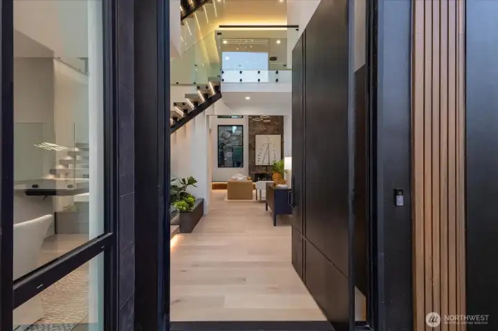 Enter through a 6x10 pivot door where you will be greeted by 30 foot foyer ceilings Enter through a 6x10 pivot door where you will be greeted by 30 foot foyer ceilings