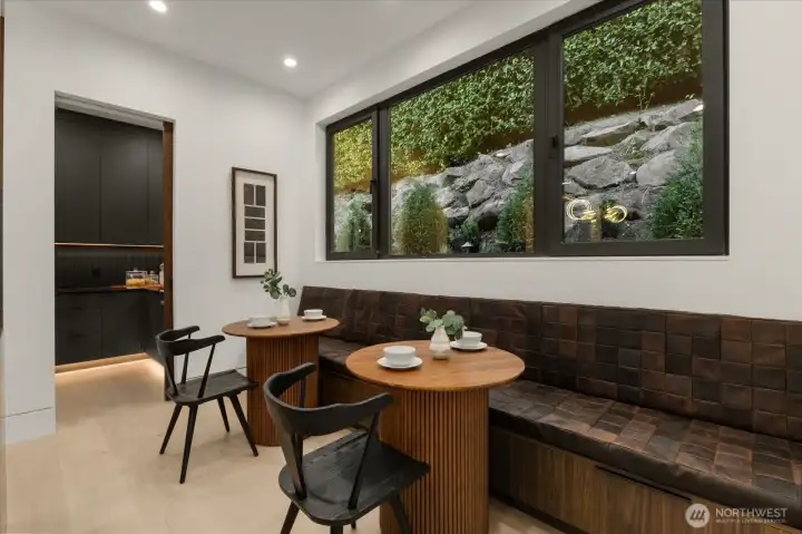Unique breakfast nook just outside a personal bonus chefs kitchen. Unique breakfast nook just outside a personal bonus chefs kitchen.