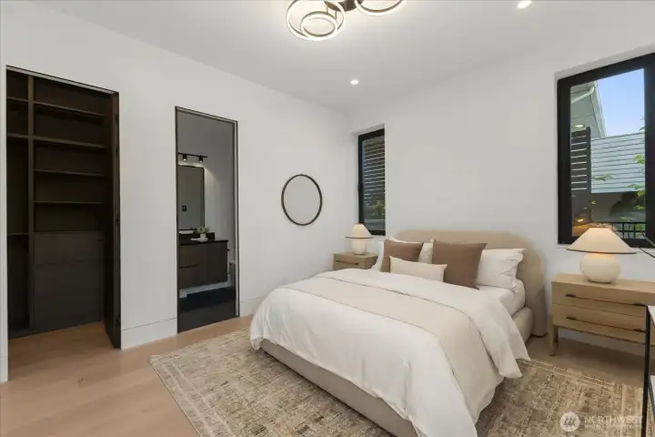 Bedroom on the main floor with walk in closets, motion sensor lights and its own bathroom. Bedroom on the main floor with walk in closets, motion sensor lights and its own bathroom.