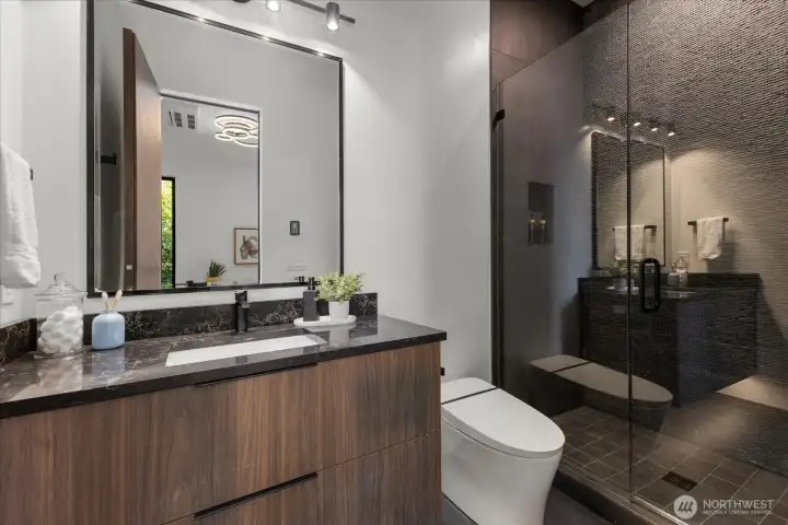 High end finished bathroom on the main floor. Along side a powder bathroom. High end finished bathroom on the main floor. Along side a powder bathroom.
