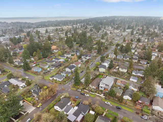 Aerial of the front of the home. Wonderful street with curbs and sidewalks and alley access. Only minutes to Amazon, downtown, the UW and 520.