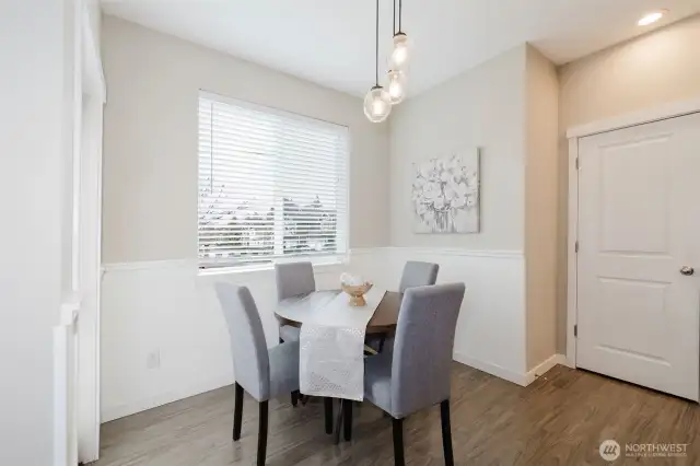 Dining area with door to fully fenced backyard & Patio