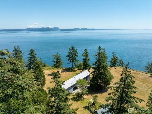 Incredible sunny parcel with expansive water and mountain views.