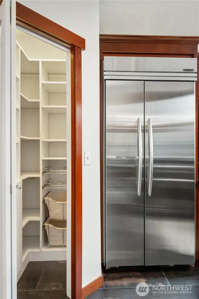 Built-in commercial grade KitchenAid refrigerator & walk-in pantry