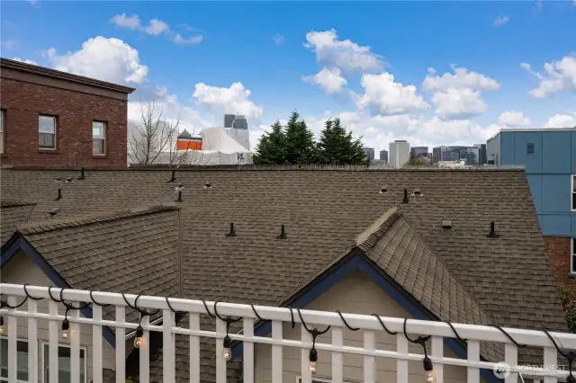 Rooftop sun terrace with western views of the downtown cityscape