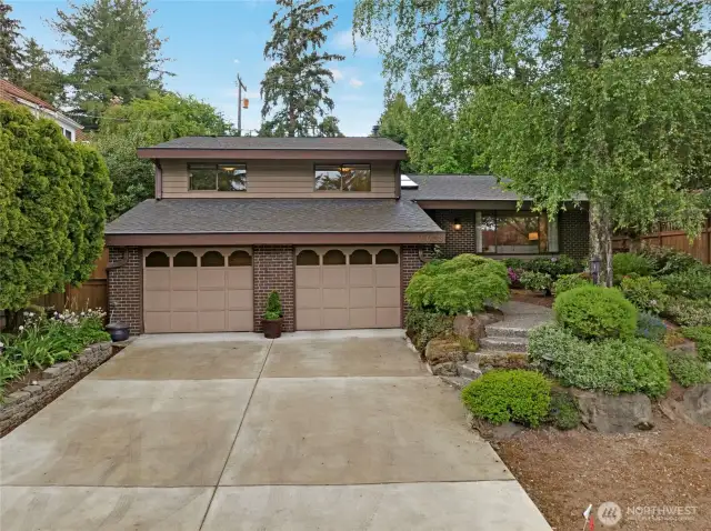 Meticulously maintained throughout the years, this sweet Mathews Beach tri-level sits perfectly above a quiet, dead-end street.