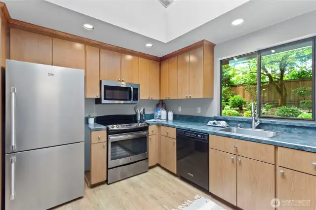 Great natural light AND a wonderful view of your botanical-like back yard.