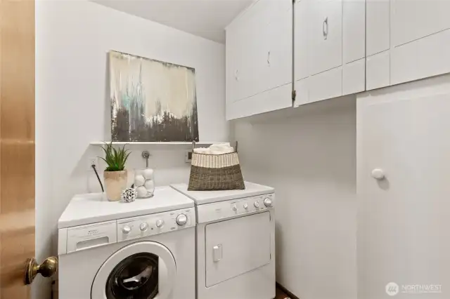 The laundry room downstairs has nice storage and is adjacent to the half bathroom. Washer and dryer are included!