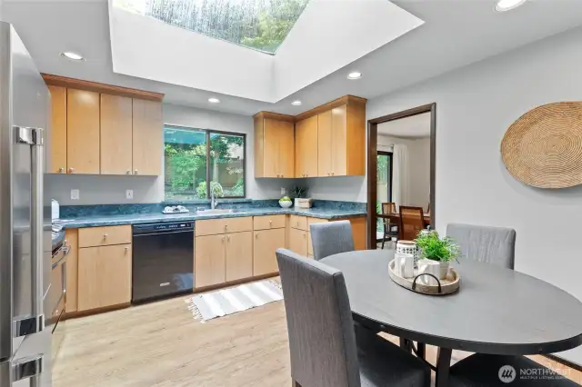 The kitchen is infused with beautiful natural light which is provided by the massive skylight.