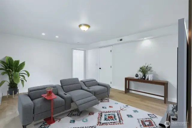 Virtually Staged. Lower level bonus room virtually staged to show layout potential. Great space for a second living area, media room, or guest retreat.