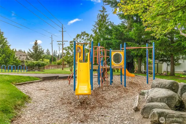 Neighborhood park just steps away with play structure, open green space, and walking paths—great for kids and outdoor fun.