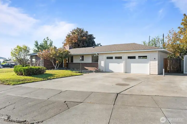 Large driveway and RV parking off to the right