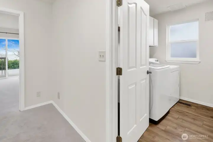 Laundry room off garage.