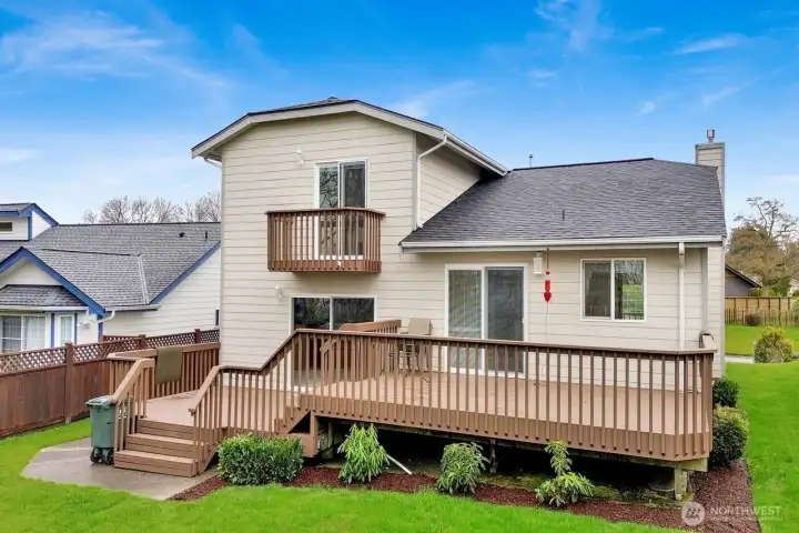 Backyard has beautiful landscaping and low maintenance. Large deck to enjoy Birch Bay views. Lower deck would be a great spot for a jacuzzi.