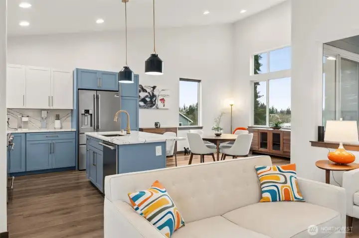 Bright, open living spaces complemented by soaring vaulted ceilings.