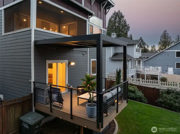 New motorized deck cover with integrated lighting installed on the lower deck by StruXure PNW.