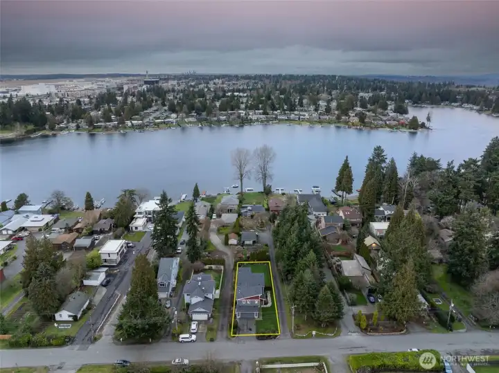Aerial view showing the property’s proximity to the lake.