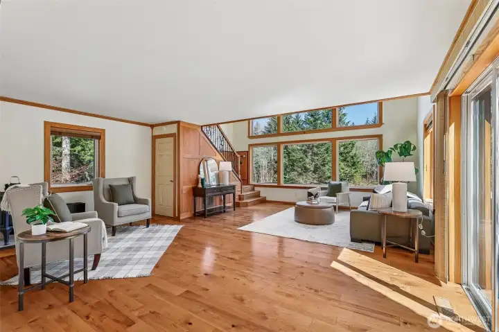Expansive view of Formal Living Room, surrounded by Light.