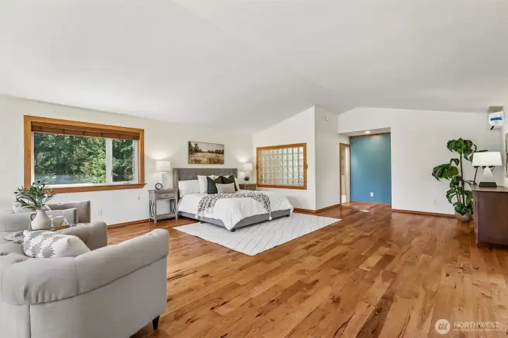 View of 960 sq. ft. Primary Bedroom from stairs