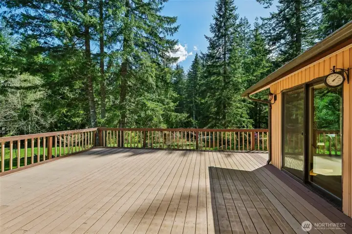Huge Deck in back with access from Either Living Room or Dining Room.