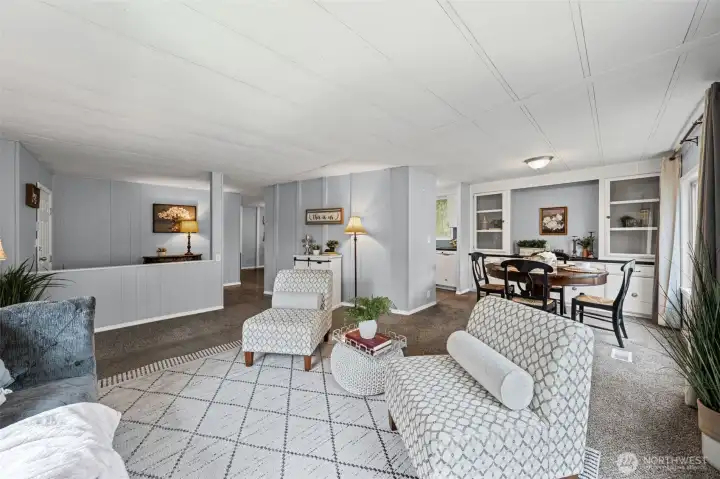 Well designed floorplan with the living, kitchen and dining area on the right side of the home and primary with en-suite, 2 guest bedrooms and full guest bathroom on the left side.