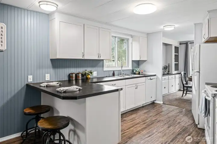 Window looks out to the backyard.