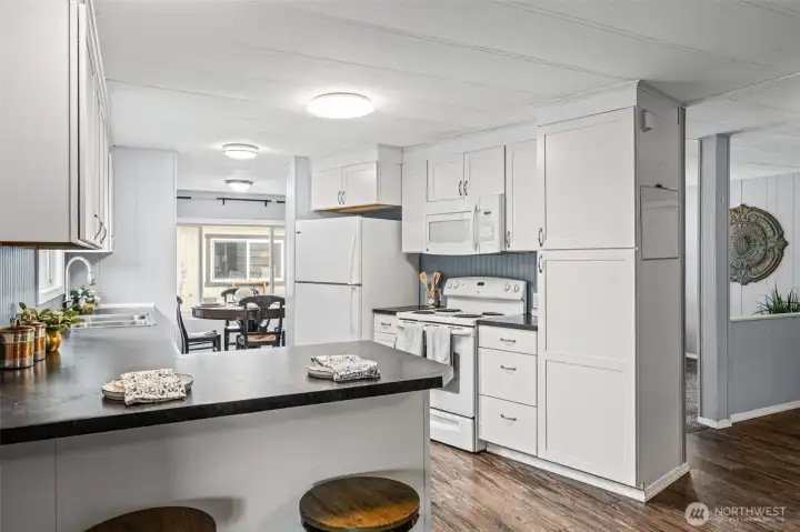 The cabinets, drawers, and a built-in pantry give plenty of storage for all your kitchen needs.