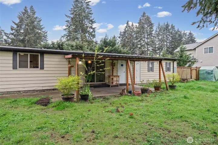 Covered concrete patio.