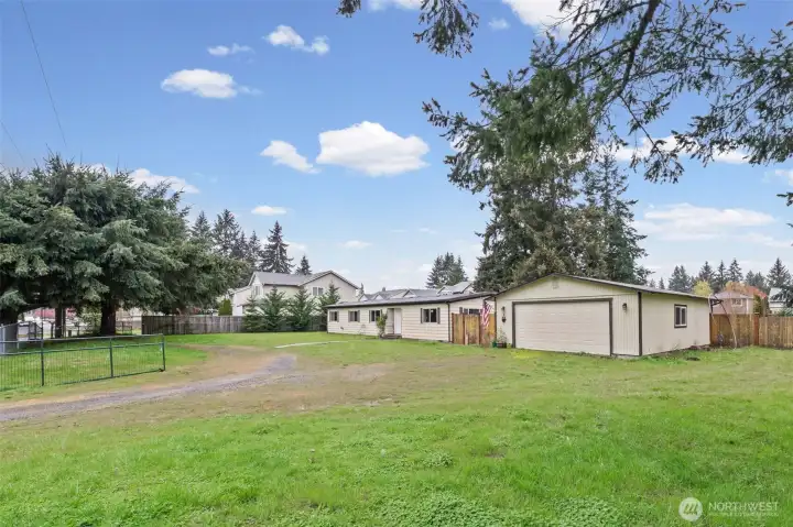 Far SE corner of the property. Notice the gate and U-shaped driveway.