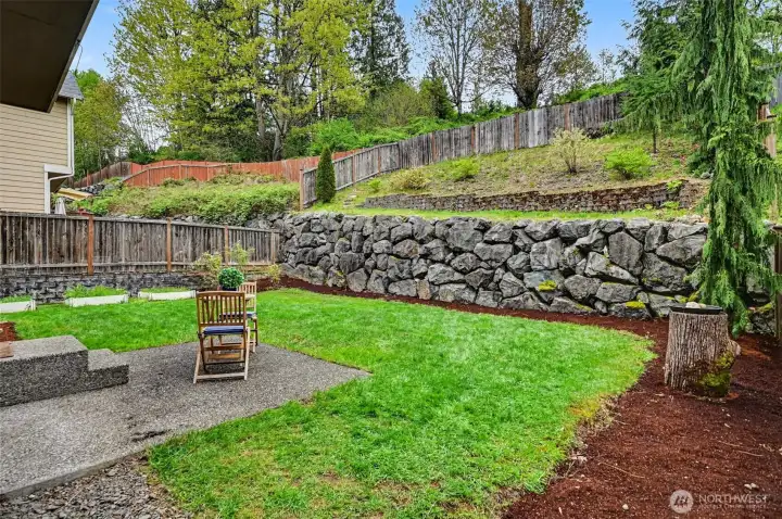 Enjoy this fully-fenced yard and private greenbelt views!