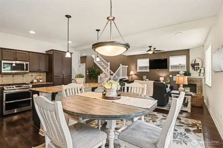 Warm and inviting great-room with newer stainless appliances.