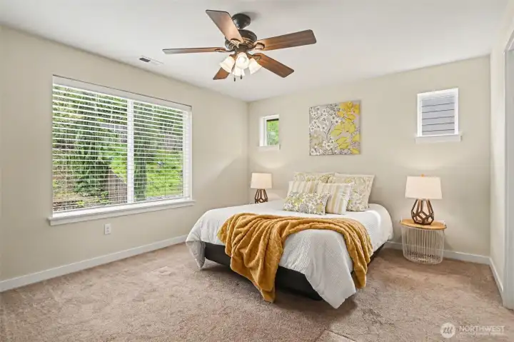 The relaxing primary suite features a large walk-in closet, 5-piece bathroom and adjacent laundry room.
