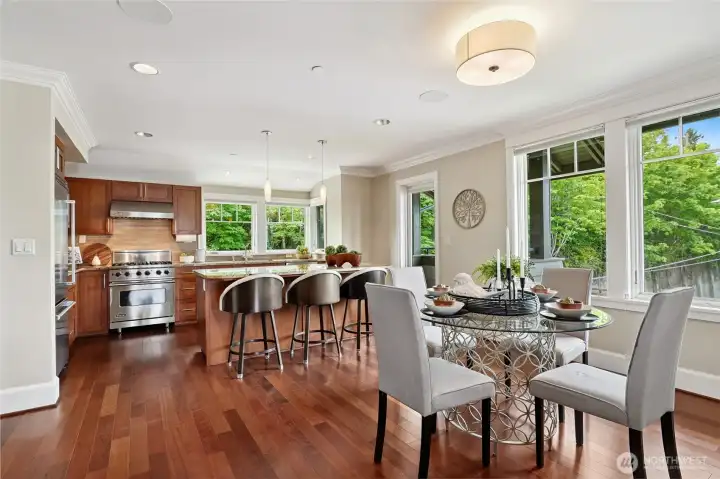 A perfect space for everyday. Open the door off the kitchen to harvest herbs on the convenient side deck. One of 4 decks!