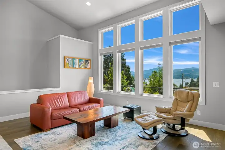 Living room windows take advantage of the view