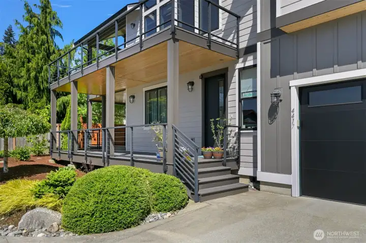 The front porches wrap aound to decks on both levels